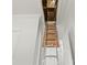 View of access to unfinished attic with drop down ladder at 1173 Yorkdale Ln, Lincolnton, NC 28092