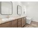 Bright bathroom with double sinks, stylish mirrors, and a soaking tub for a luxurious experience at 1173 Yorkdale Ln, Lincolnton, NC 28092