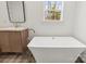 Bathroom featuring a modern freestanding bathtub and a vanity at 1173 Yorkdale Ln, Lincolnton, NC 28092