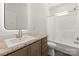 Bathroom featuring a vanity with quartz countertop, modern lighting, and shower with curtain at 1173 Yorkdale Ln, Lincolnton, NC 28092