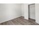 A bedroom with neutral walls, hardwood floors, and a closet at 1173 Yorkdale Ln, Lincolnton, NC 28092