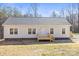 A ranch style home with a front porch and white siding at 1173 Yorkdale Ln, Lincolnton, NC 28092