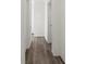 A hallway with hardwood floors and white trim at 1173 Yorkdale Ln, Lincolnton, NC 28092