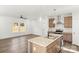 Modern kitchen featuring an island with granite countertop, stainless steel appliances, and stylish pendant lighting at 1173 Yorkdale Ln, Lincolnton, NC 28092