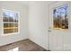 Inviting room with natural light streaming through the window, complemented by a stylish door at 1173 Yorkdale Ln, Lincolnton, NC 28092