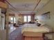 Bedroom featuring hardwood floors, exposed ductwork, and large windows for natural light at 120 B E Innes St, Salisbury, NC 28144