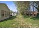 Expansive backyard featuring lush lawn and mature trees perfect for outdoor activities and relaxing in a serene environment at 1207 Overhill Rd, Salisbury, NC 28144