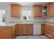 Spacious kitchen with wood cabinetry, countertops, and appliances, offering ample storage at 1207 Overhill Rd, Salisbury, NC 28144