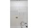 Functional laundry area features essential hookups and shelving for optimal laundry organization and convenience at 1207 Overhill Rd, Salisbury, NC 28144