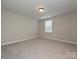 Bedroom featuring neutral carpet, bright window, and neutral paint at 1324 Sage Pine Cir, Clover, SC 29710