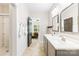 Charming bathroom with double vanity and easy access to the shower and bedroom at 174 Logan Crossing Dr, Davidson, NC 28036
