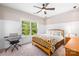 Cozy bedroom with natural light and warm tones, perfect for relaxation at 174 Logan Crossing Dr, Davidson, NC 28036