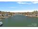 Wide aerial view of the lake homes and boat docks on Lake Norman at 17701 Springwinds Dr, Cornelius, NC 28031