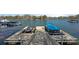 View of private boat dock with personal watercraft and boat lift at 17701 Springwinds Dr, Cornelius, NC 28031