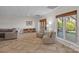 Cozy living space with comfortable seating, large windows, and stylish decor at 17701 Springwinds Dr, Cornelius, NC 28031