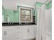 Bathroom with a vanity, dual sinks, and a shower and tub combination at 1774 Hwy 55 E Hwy, Clover, SC 29710