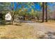 Lovely brick home with mature trees in a spacious front yard with a long driveway at 1774 Hwy 55 E Hwy, Clover, SC 29710