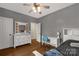 Serene bedroom with hardwood floors, ample natural light, a ceiling fan, and a calming color scheme at 2050 Sunswept Ln, York, SC 29745