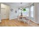 Charming dining area with large windows, a pendant light, and a round table with comfortable seating at 2050 Sunswept Ln, York, SC 29745