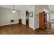 Dining room showcases beautiful hardwood floors with views into the kitchen and living area at 2050 Sunswept Ln, York, SC 29745
