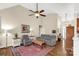 Cozy living room features hardwood floors, a ceiling fan, and neutral tones, creating a comfortable and inviting atmosphere at 2050 Sunswept Ln, York, SC 29745