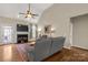 Spacious living room boasts a fireplace, vaulted ceiling, and hardwood floors, perfect for gatherings at 2050 Sunswept Ln, York, SC 29745