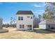 Exterior of a new two story home featuring a sliding glass door and backyard at 2125 Tom Sadler Rd # 7159, Charlotte, NC 28214