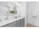 Bathroom featuring a double sink vanity, white countertops and grey cabinets at 2125 Tom Sadler Rd # 7159, Charlotte, NC 28214