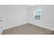 This simple bedroom has great natural light and is ready for your personal touch at 2125 Tom Sadler Rd # 7159, Charlotte, NC 28214