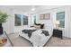 This bedroom has bright, natural light with neutral decor and lots of space at 2125 Tom Sadler Rd # 7159, Charlotte, NC 28214