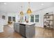 Bright, open kitchen with a large center island, modern appliances, and stylish pendant lighting at 2125 Tom Sadler Rd # 7159, Charlotte, NC 28214