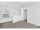 The spacious loft area offers natural light and a cozy space at 2125 Tom Sadler Rd # 7159, Charlotte, NC 28214