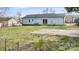 Large backyard, ideal for Gathering events, with a patio and ample green space at 2509 Lanecrest Dr, Charlotte, NC 28215