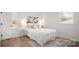Cozy bedroom with a plush bed, decorative rug, and well-lit ambiance at 2509 Lanecrest Dr, Charlotte, NC 28215