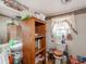 Cozy bathroom with a classic toilet, mirror, and open shelving at 265 Sailboat Dr, Salisbury, NC 28146