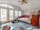 Bedroom with large windows and a ceiling fan, offering a blank canvas for personalization at 265 Sailboat Dr, Salisbury, NC 28146