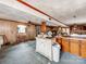Open kitchen with ample counter space and classic wood cabinetry needs TLC at 265 Sailboat Dr, Salisbury, NC 28146