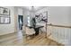Dining room with a modern table set, elegant chairs, and a sliding glass door at 2656 Grantham Place Dr, Fort Mill, SC 29715