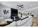 Open-concept living area boasting a modern fireplace, hardwood floors, and abundant natural light at 2656 Grantham Place Dr, Fort Mill, SC 29715
