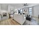 Inviting living room with stylish decor, hardwood floors, a modern lamp, and abundant natural light at 2656 Grantham Place Dr, Fort Mill, SC 29715