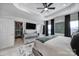 Spacious main bedroom features a closet and a mirrored dresser with a TV at 2656 Grantham Place Dr, Fort Mill, SC 29715