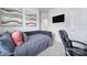 Office space featuring a daybed with stylish pillows, complemented by a desk area with a black office chair at 2656 Grantham Place Dr, Fort Mill, SC 29715