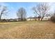 Wide view of the home's expansive backyard and a view of the home from the rear at 2687 Glenn St, Newton, NC 28658
