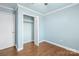 This bedroom offers ample closet space, wood floors and fresh paint at 2687 Glenn St, Newton, NC 28658
