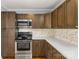 Eat in kitchen with stainless steel appliances, marble backsplash and custom cabinets at 2687 Glenn St, Newton, NC 28658