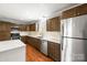 Kitchen view with stainless steel appliances, breakfast bar, and stainless steel appliances at 2687 Glenn St, Newton, NC 28658