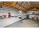 Inside the shed featuring shelving and storage space at 2687 Glenn St, Newton, NC 28658
