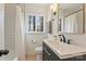 Well-lit bathroom with a combination shower and tub, modern fixtures, and an inviting vanity at 2827 Temple Ln, Charlotte, NC 28205