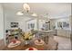 Open concept kitchen with stainless steel appliances, a large island with seating, and views to the living room at 2827 Temple Ln, Charlotte, NC 28205