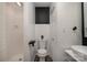 Modern bathroom with a walk-in shower, stylish black accents, and a floating sink at 3231 Eastwood Dr, Charlotte, NC 28205